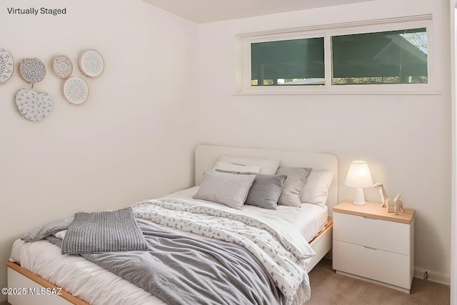 bedroom featuring carpet flooring