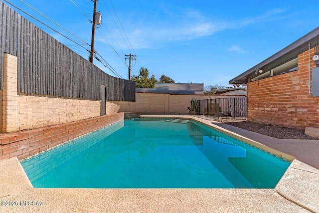 view of pool featuring a fenced in pool and a fenced backyard