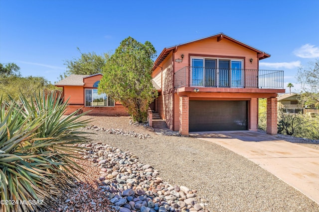 view of front of property featuring a garage