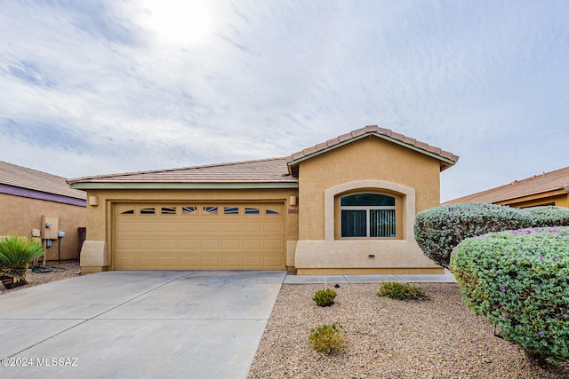 view of front of property featuring a garage