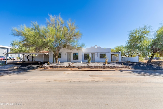 view of front of house featuring a carport