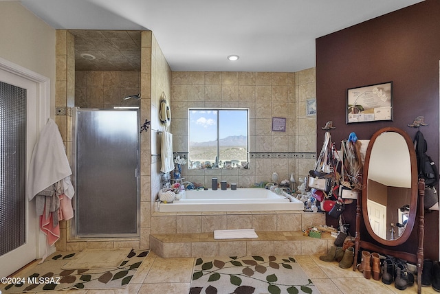 bathroom with plus walk in shower and tile patterned flooring