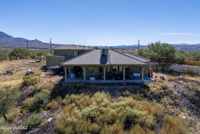 exterior space featuring a mountain view