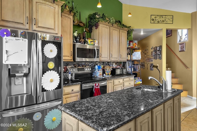 kitchen featuring backsplash, light tile patterned floors, light brown cabinetry, sink, and stainless steel appliances