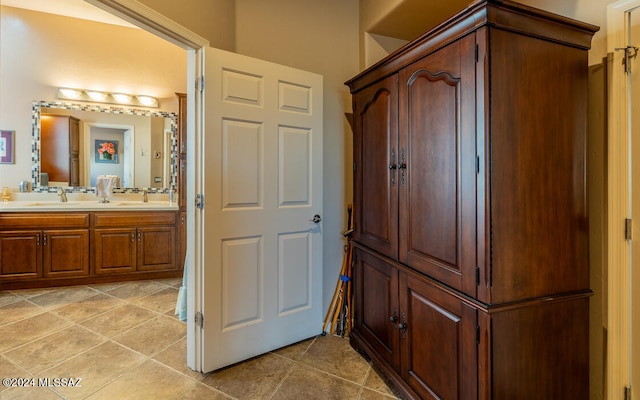 bathroom featuring vanity and tile patterned floors