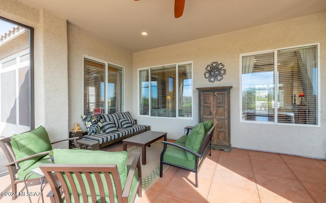 view of patio / terrace featuring an outdoor living space and ceiling fan