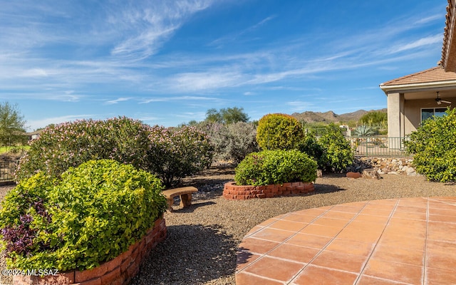 view of patio / terrace with a mountain view