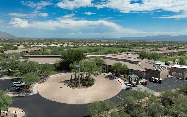 drone / aerial view featuring a mountain view