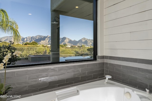 room details with a mountain view and a bathtub