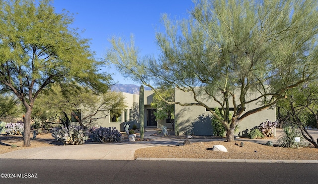 view of adobe home