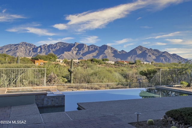 view of pool featuring a mountain view