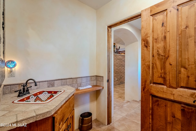 bathroom featuring tile patterned floors and sink