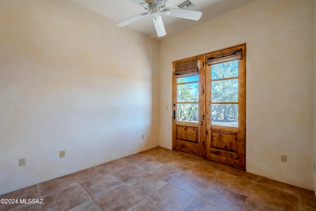 entrance foyer with ceiling fan