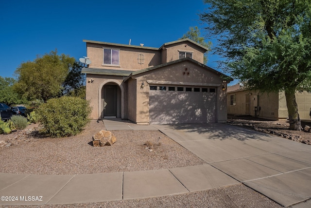 view of front of property featuring a garage