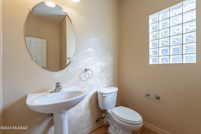 bathroom with toilet and sink