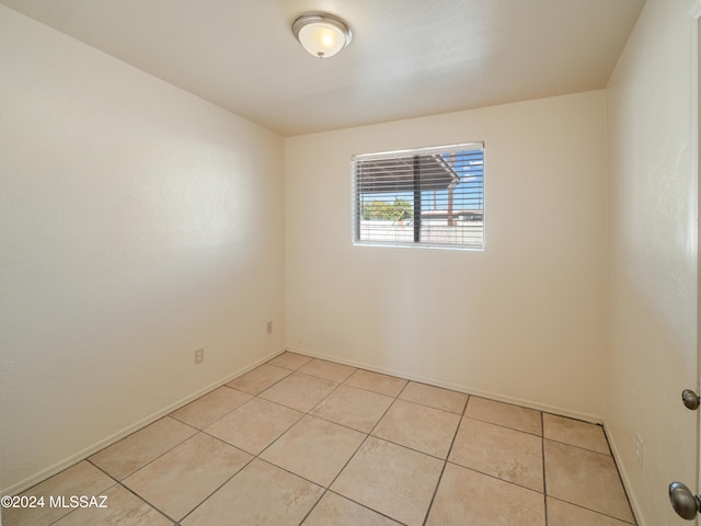 view of tiled spare room