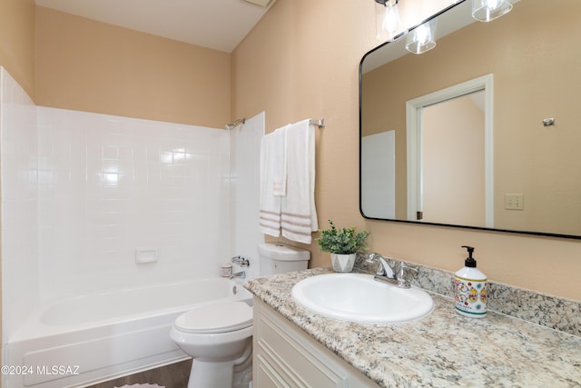 bathroom with toilet, vanity, and shower / bathing tub combination