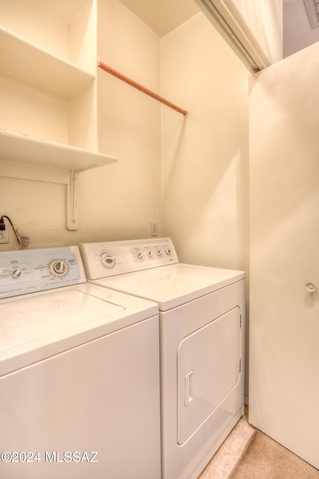 washroom with laundry area and separate washer and dryer