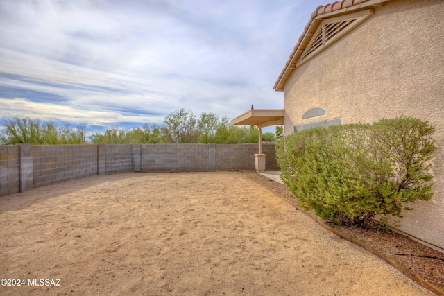 view of yard with a fenced backyard