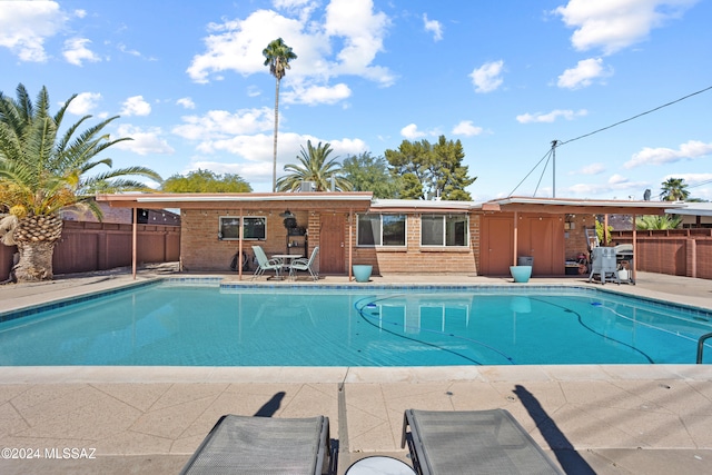 view of pool with a patio