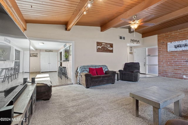 carpeted living room with wood ceiling, lofted ceiling with beams, track lighting, and ceiling fan