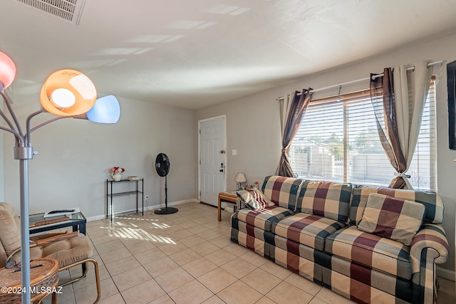 living room with light tile patterned floors