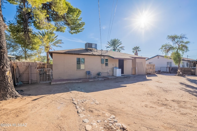 back of house featuring a patio and central AC unit