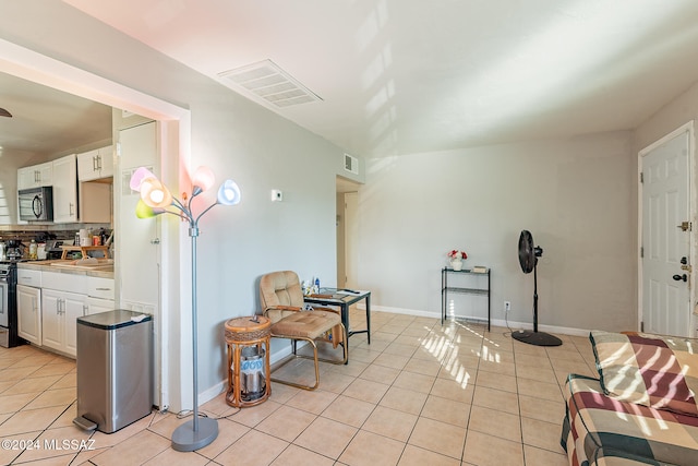 interior space featuring light tile patterned floors