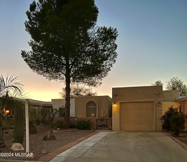 view of front of property featuring a garage