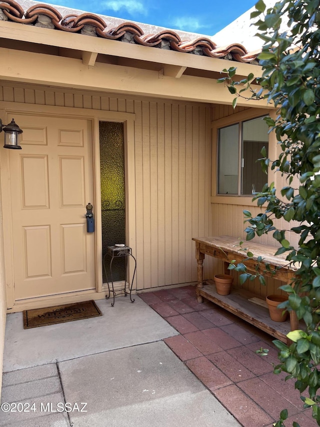 entrance to property with a patio area