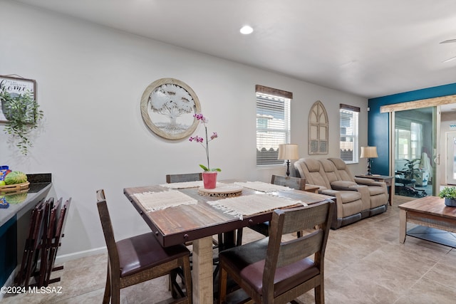 dining room featuring light tile patterned floors