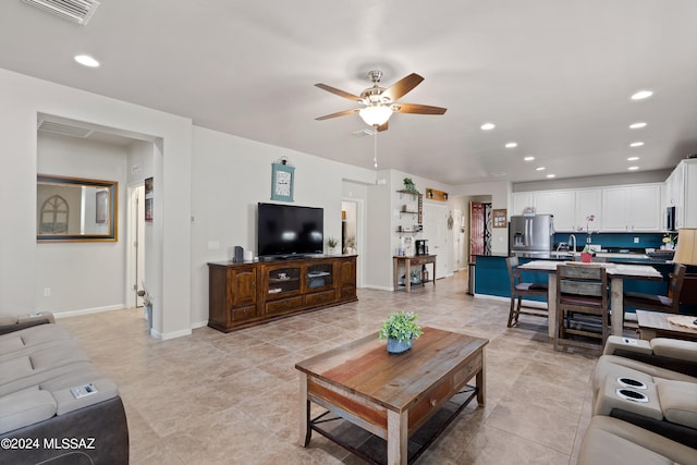 living room featuring ceiling fan