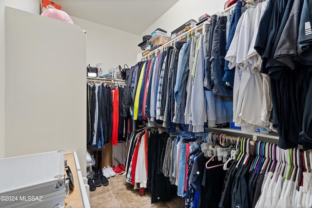 walk in closet featuring tile patterned floors