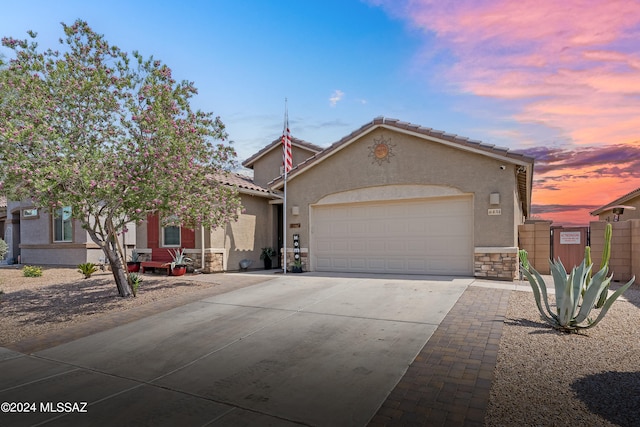 view of front of home with a garage