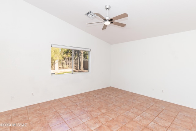 spare room with lofted ceiling and ceiling fan