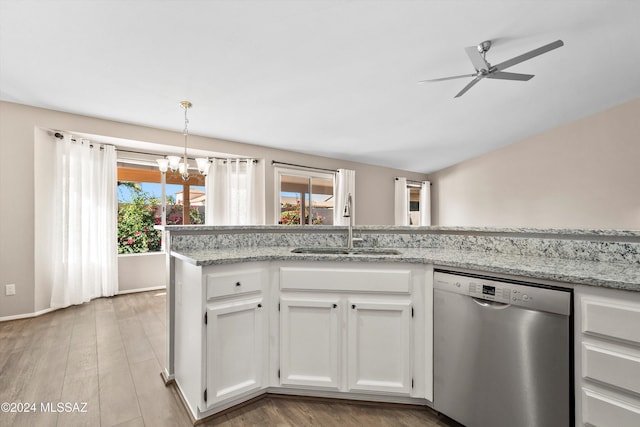 kitchen with light stone countertops, ceiling fan with notable chandelier, sink, dishwasher, and white cabinetry