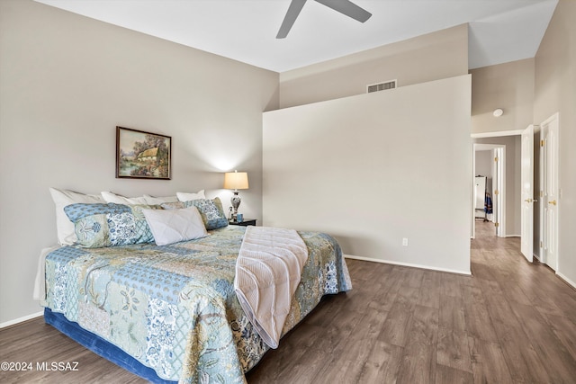 bedroom with ceiling fan and hardwood / wood-style floors