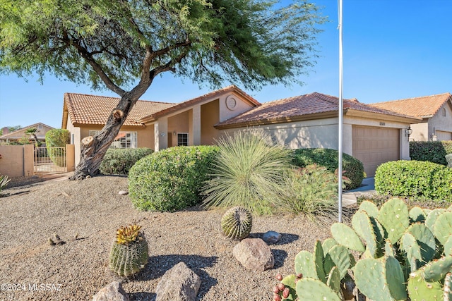 view of front of property with a garage