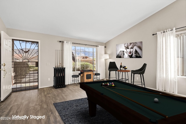 recreation room with hardwood / wood-style flooring, billiards, and vaulted ceiling