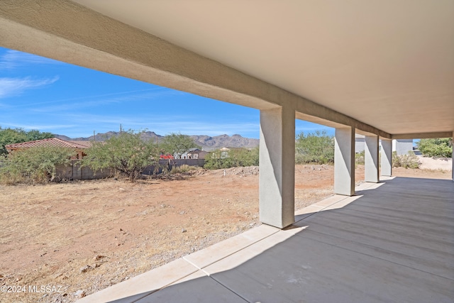 view of patio / terrace featuring a mountain view