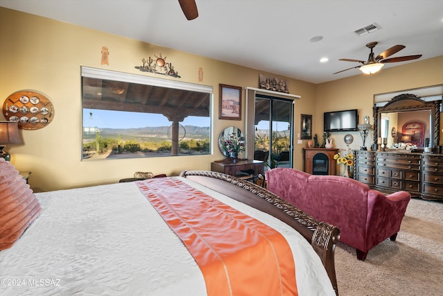 19931 S Sterling Ave, Mammoth, AZ 85618 - carpeted bedroom featuring access to outside and ceiling fan