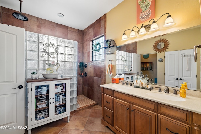 19931 S Sterling Ave, Mammoth, AZ 85618 - bathroom featuring a tile shower, vanity, and tile patterned floors