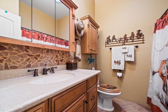 19931 S Sterling Ave, Mammoth, AZ 85618 - bathroom with backsplash, tile patterned flooring, vanity, and toilet
