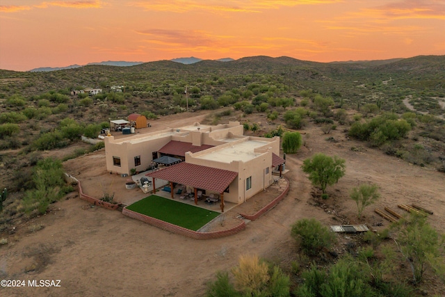 19931 S Sterling Ave, Mammoth, AZ 85618 - aerial view at dusk featuring a mountain view