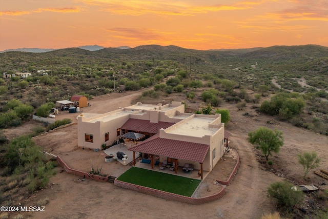 19931 S Sterling Ave, Mammoth, AZ 85618 - aerial view at dusk featuring a mountain view