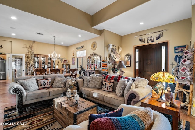 19931 S Sterling Ave, Mammoth, AZ 85618 - living room with tile patterned flooring and an inviting chandelier