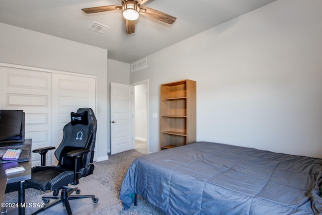 bedroom featuring carpet flooring, a closet, and ceiling fan