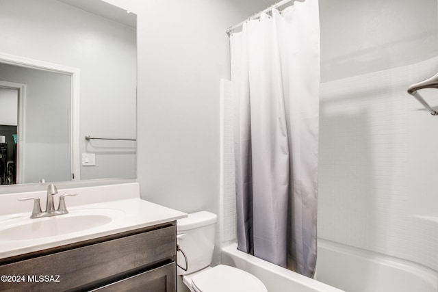 full bathroom with vanity, toilet, and shower / bathtub combination with curtain