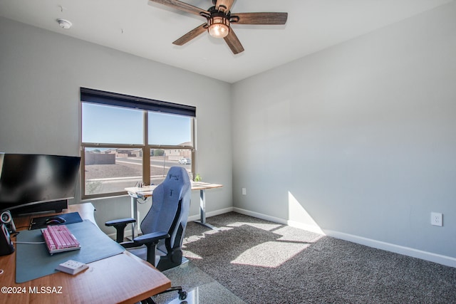 home office featuring carpet flooring and ceiling fan