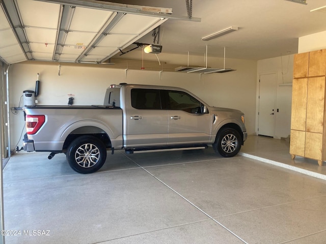 garage featuring a garage door opener